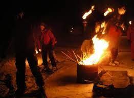 Torchlight procession on cross-country skis